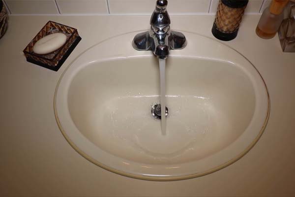 opening a hot water faucet